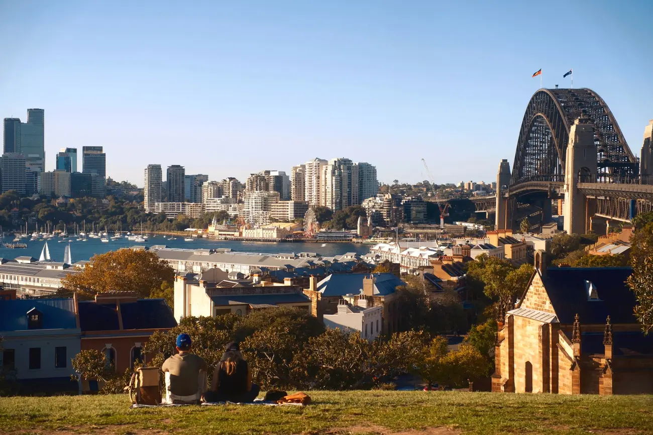A couple looking out over Sydney Harbour
